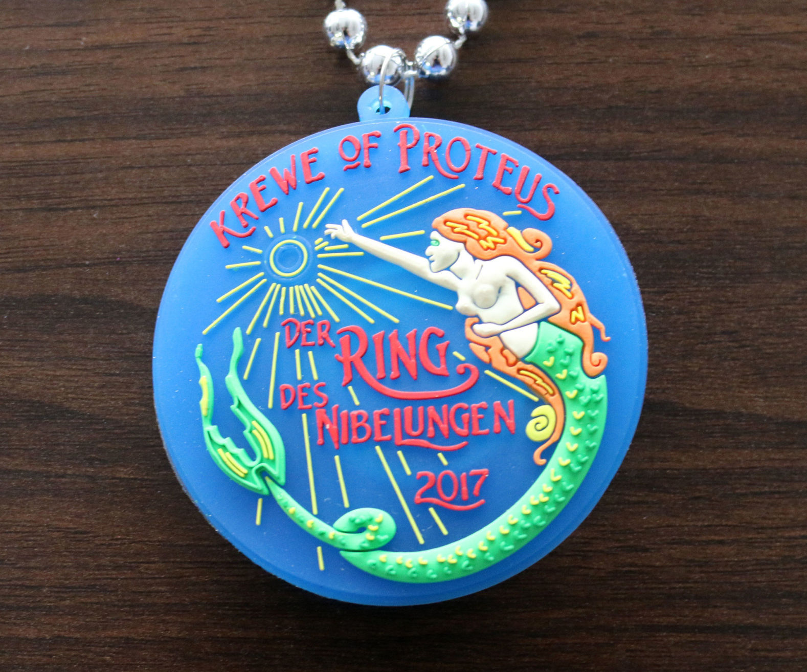 Krewe of Proteus throws: tridents, seahorses and mermaids